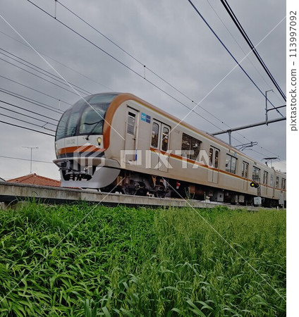 Tokyo Metro running above ground Tokyo Metro running above ground 113997092