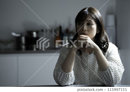 Housewives troubled by the kitchen Housewives troubled by the kitchen 113997151