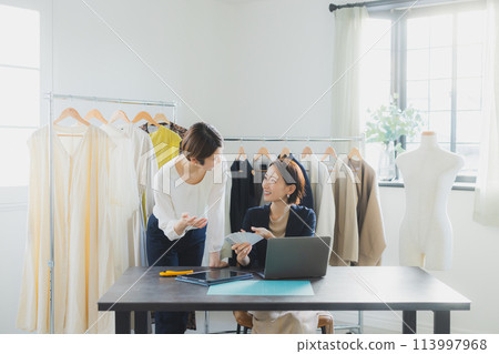 Women working in the apparel industry Women working in the apparel industry 113997968
