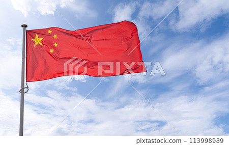 Chinese flag is waving in wind. China symbol Chinese flag is waving in wind. China symbol 113998989
