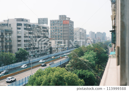 Cityscape seen from the hotel window Cityscape seen from the hotel window 113999388