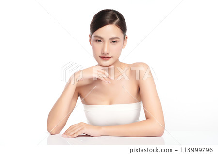 Beautiful young asian woman with clean fresh skin on white background, Face care, Facial treatment, Cosmetology, beauty and spa, Asian women portrait. Beautiful young asian woman with clean fresh skin on white background, Face care, Facial treatment, Cosmetology, beauty and spa, Asian women portrait. 113999796