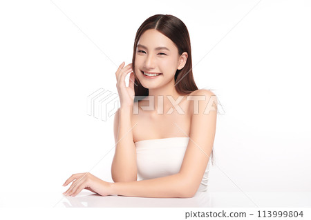 Beautiful young asian woman with clean fresh skin on white background, Face care, Facial treatment, Cosmetology, beauty and spa, Asian women portrait. Beautiful young asian woman with clean fresh skin on white background, Face care, Facial treatment, Cosmetology, beauty and spa, Asian women portrait. 113999804