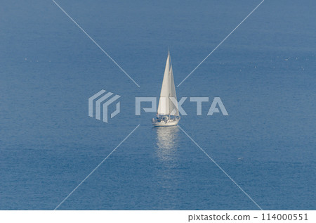 yacht sailing the sea, clear sky and blue water, recreational sport yacht sailing the sea, clear sky and blue water, recreational sport 114000551