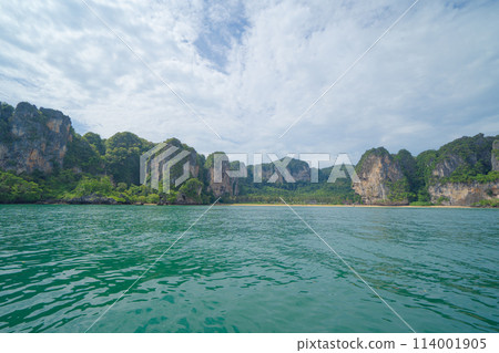 Clear blue turquoise seawater, Andaman sea in Phuket island in summer season, Thailand. Water in ocean pattern wallpaper background. Clear blue turquoise seawater, Andaman sea in Phuket island in summer season, Thailand. Water in ocean pattern wallpaper background. 114001905