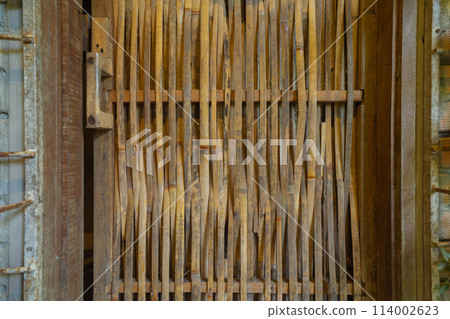 Natural wood slats wall or lath line arrange. Flooring pattern surface texture. Close-up of interior architecture material for design decoration background. 114002623