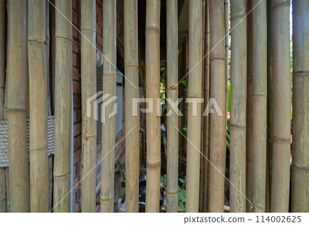 Natural wood slats wall or lath line arrange. Flooring pattern surface texture. Close-up of interior architecture material for design decoration background. 114002625