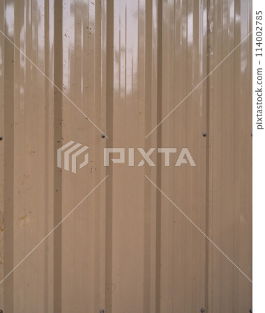 Metal steel strips. Rusty corrugated iron metal, Zinc steel wall, pattern texture background. Close-up of exterior architecture material for design decoration background. Metal steel strips. Rusty corrugated iron metal, Zinc steel wall, pattern texture background. Close-up of exterior architecture material for design decoration background. 114002785