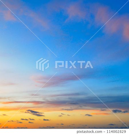 Blue sky with clouds and bright sunrise. 114002829