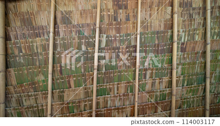 A roof made of dried nipa palm leaves. 114003117