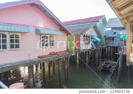 Koh Panyee, The Floating village urban city town houses, lake sea or river. Nature landscape fisheries and fishing tools at Pak Pha, Phang Nga, Thailand. Aquaculture farming 114003136