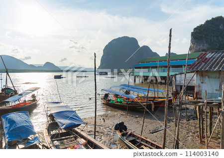 Koh Panyee, The Floating village urban city town houses, lake sea or river. Nature landscape fisheries and fishing tools at Pak Pha, Phang Nga, Thailand. Aquaculture farming 114003140