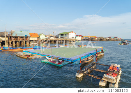 Koh Panyee, The Floating village urban city town houses, lake sea or river. Nature landscape fisheries and fishing tools at Pak Pha, Phang Nga, Thailand. Aquaculture farming 114003153