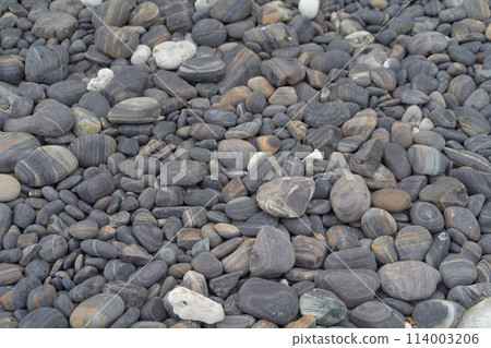 Granite gravel stone rocks flooring pattern surface texture. Close-up of exterior material for design decoration background. Rubble 114003206