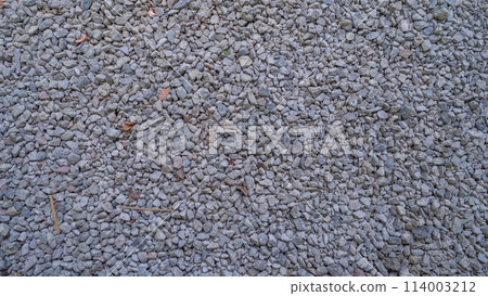 Granite gravel stone rocks flooring pattern surface texture. Close-up of exterior material for design decoration background. Rubble 114003212