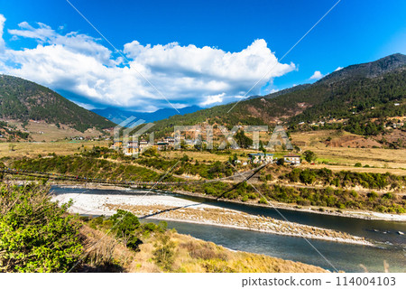 The Punakha Suspension Bridge at the Punakha Dzong in Bhutan. The Punakha Suspension Bridge at the Punakha Dzong in Bhutan. 114004103