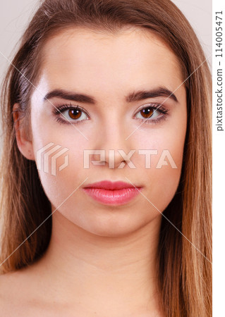 Closeup portrait of young teenager woman. 114005471