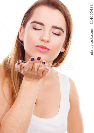 Teenager woman sending air kisses, love gesture Teenager woman sending air kisses, love gesture 114005488