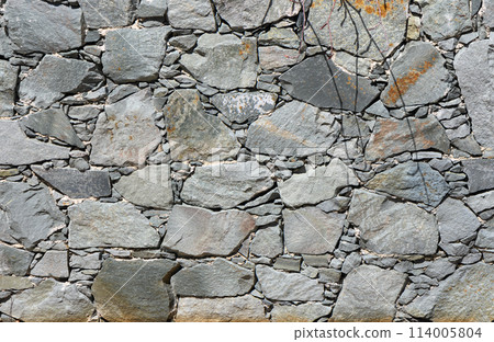 Natural stone granite wall. Seamless texture. Perfect tiled on all sides. 114005804