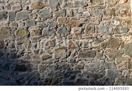 Background of brown-gray stone wall . Pattern of slate wall texture and background Background of brown-gray stone wall . Pattern of slate wall texture and background 114005893