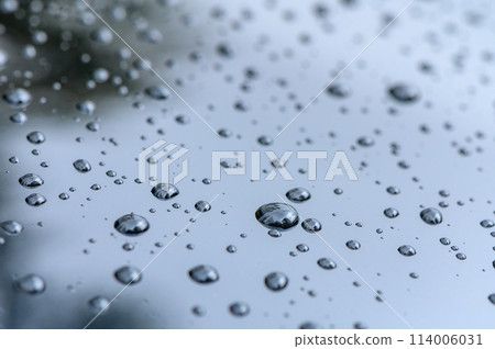 Raindrops on the surface of the car glass. Raindrops natural abstract background. 3 114006031