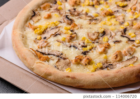 Delicious pizza with corn, cheese, tomatoes and mushrooms, salt, spices and herbs 114006720