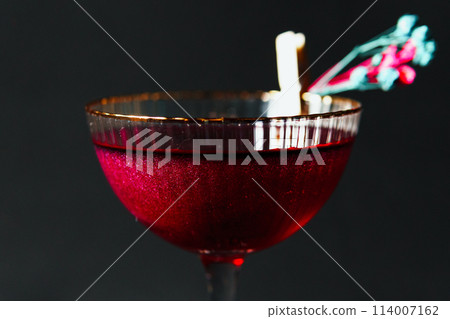 Alcoholic drink. A cocktail with elite alcohol on dark black background 114007162