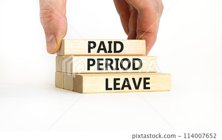 Paid period leave symbol. Concept words Paid period leave on wooden blocks. Beautiful white table white background. Doctor hand. Business medical paid period leave concept. Copy space. Paid period leave symbol. Concept words Paid period leave on wooden blocks. Beautiful white table white background. Doctor hand. Business medical paid period leave concept. Copy space. 114007652