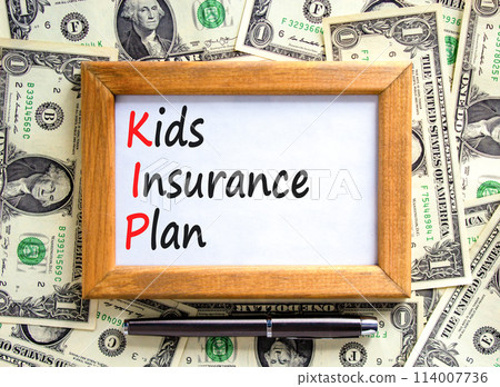 KIP kids insurance plan symbol. Concept words KIP kids insurance plan on beautiful wooden frame. Beautiful dollar bills background. Business KIP kids insurance plan concept. Copy space. KIP kids insurance plan symbol. Concept words KIP kids insurance plan on beautiful wooden frame. Beautiful dollar bills background. Business KIP kids insurance plan concept. Copy space. 114007736