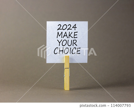 2024 Make your choice symbol. Concept words 2024 Make your choice on beautiful white paper on clothespin. Beautiful grey background. Business 2024 Make your choice concept. Copy space 2024 Make your choice symbol. Concept words 2024 Make your choice on beautiful white paper on clothespin. Beautiful grey background. Business 2024 Make your choice concept. Copy space 114007793
