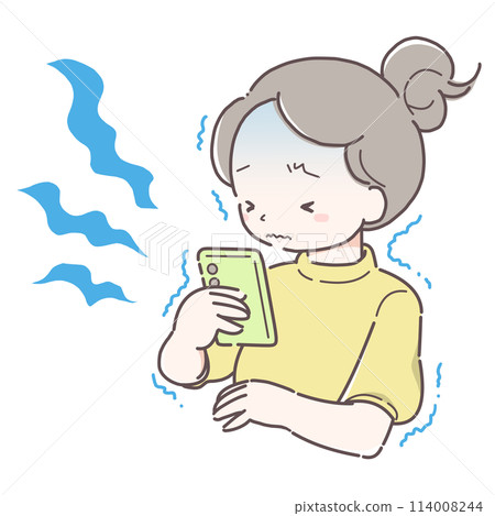 一個女人顫抖著看著她的智慧型手機 一個女人顫抖著看著她的智慧型手機 114008244