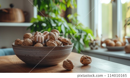 Tabletop adorned with a bowl of nuts and a lush, green plant, Ai Generated 114010165