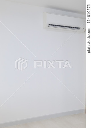 air conditioner on a white wall in the interior of a child's bedroom. air conditioner on a white wall in the interior of a child's bedroom. 114010773