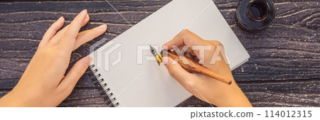 Women's hands in a wooden background holding a signboard, drawing block, paper, mockup BANNER, LONG FORMAT Women's hands in a wooden background holding a signboard, drawing block, paper, mockup BANNER, LONG FORMAT 114012315