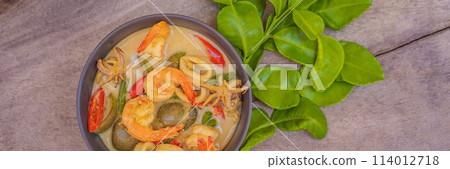 Thai food chicken green curry on dark wooden background. top view BANNER, LONG FORMAT 114012718