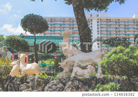 May 30 2023 Ancient statue of Goat in Wong Tai Sin Temple May 30 2023 Ancient statue of Goat in Wong Tai Sin Temple 114016382