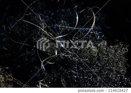 Metal chips produced during lathe processing Metal chips produced during lathe processing 114018427