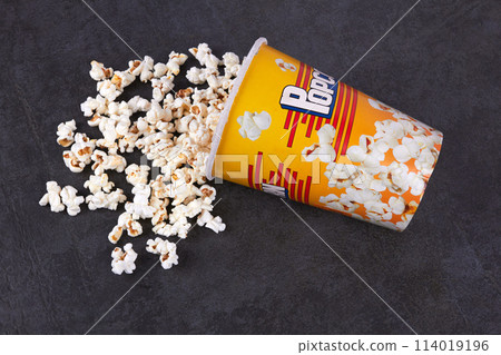 Scattered popcorn from bucket 114019196