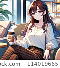 Woman enjoying morning coffee at cafe 114019665