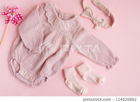 Set of pink clothes and accessories for newborn baby. Set of pink clothes and accessories for newborn baby. 114020862