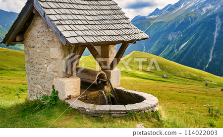 Ancient Medieval Stone Water Well in a Mountain Landscape - Generative Ai 114022003