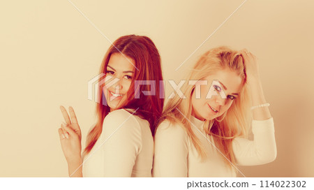 Blonde and mulatto girl together. Blonde and mulatto girl together. 114022302