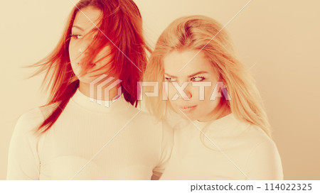 Two young friends together. 114022325