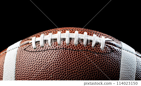 American Football Ball Isolated on Black Background with Copy Space - Generative Ai 114023150