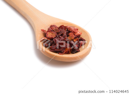 red paprika dried pepper in wooden spoon isolated on the white red paprika dried pepper in wooden spoon isolated on the white 114024645