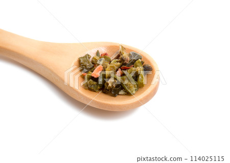 wooden spoon filled with spices isolated on the white wooden spoon filled with spices isolated on the white 114025115