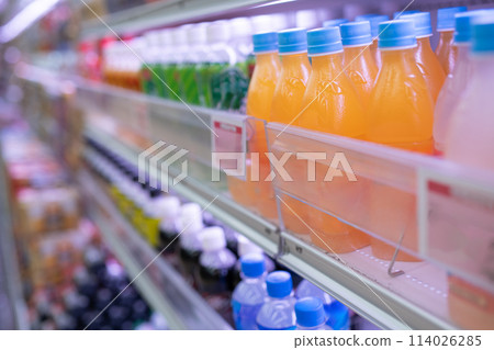 Lots of bottled drinks 114026285