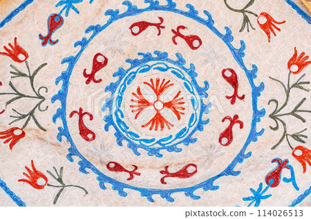 vintage white rug with traditional Arabic Uzbek pattern in Uzbekistan close up 114026513