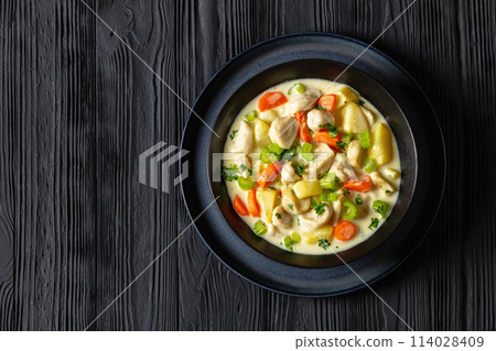 Knoephla soup, german dumpling soup in a bowl Knoephla soup, german dumpling soup in a bowl 114028409