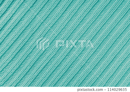 Jersey textile background , turquoise diagonal striped knitted fabric, cloth surface Jersey textile background , turquoise diagonal striped knitted fabric, cloth surface 114029635